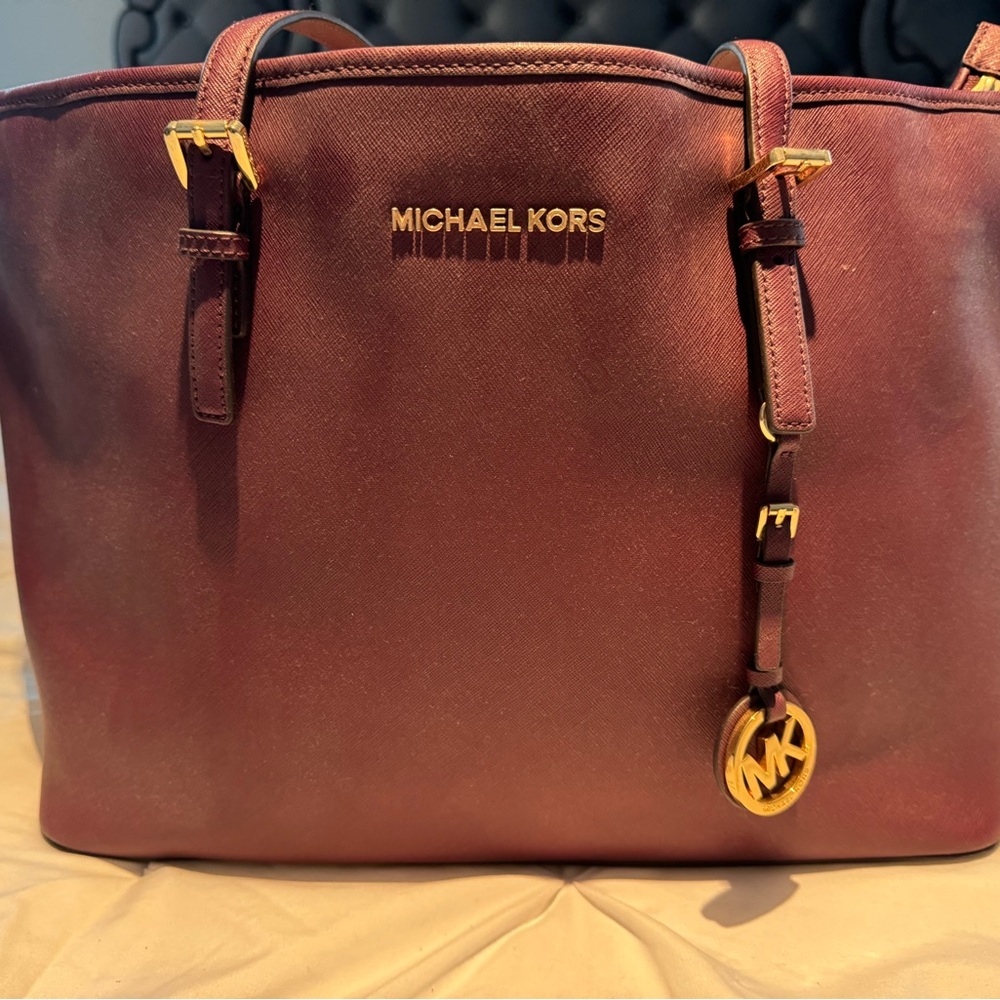 Michael Kors jet set multifunction tote Plum